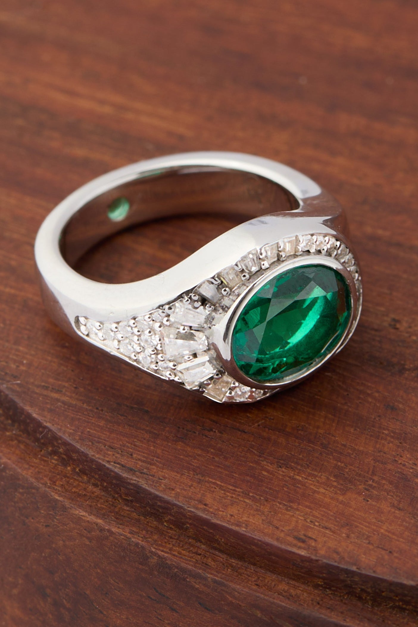 Oval emerald ring in sterling silver